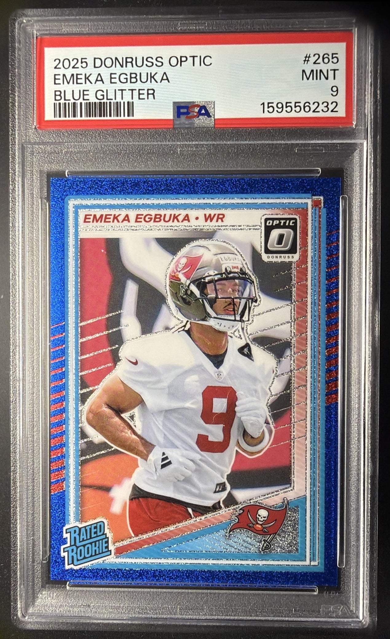 2025 Panini Donruss Optic Emeka Egbuka #265 Rated Rookie Blue Glitter Prizm PSA 9